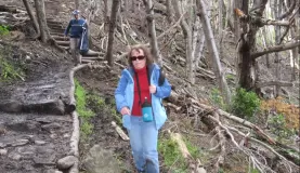 Nina descending from the muddy trail - Tierre del Fuego NP 