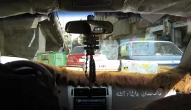 typical taxi in Cairo - note the Quran on the dash