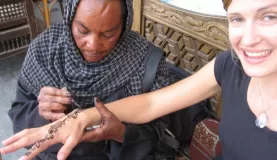 Getting a henna tattoo.