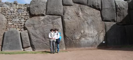 Us in front of huge rock in Sacsayhuaman-Cuzco