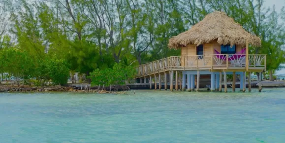 All-Inclusive Private Island Resort in Belize offering overwater bungalows