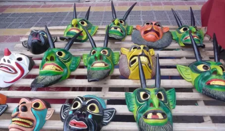 Celebration masks at the Otavalo market