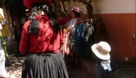 Ladies demonstrating how wool is dyed