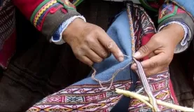 Weaving the wool into shawls.