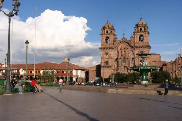 Relax in the bustling Cusco plaza and watch the people go by during your Peru travels