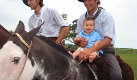 Going for his first horseback ride with a real gaucho