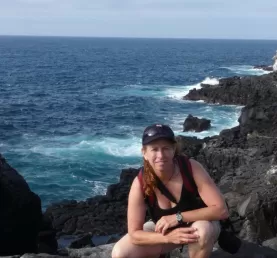 Hero shot Rhonda on sea cliff near albatross  colony