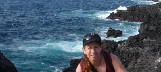 Hero shot Rhonda on sea cliff near albatross  colony