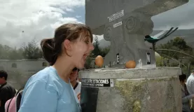 Egg balanced on nail at the equator