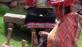 Weaving on looms outside Cusco
