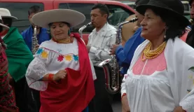 Dancers in a street parade in Quito
