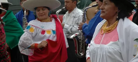 Dancers in a street parade in Quito