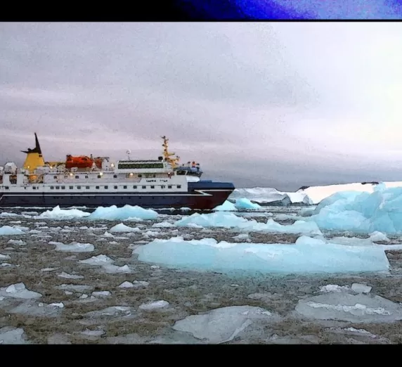 The M/V Sarpik Ittuk among the ice floes.