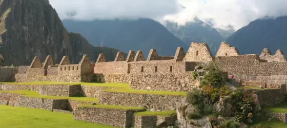 Watch the afternoon sunlight glow on the walls of Machu Picchu on your Peru tour