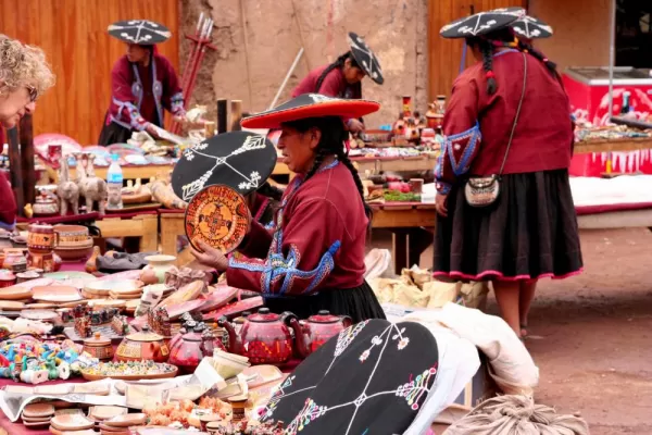 Buy lovely handmade goods from the local people at the market in Raqchi during your Peru travels