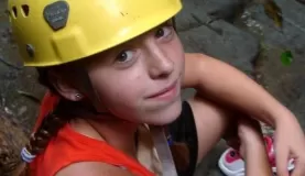 Gabs readying for a waterfall rappel 
