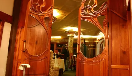 Beautiful woodwork welcomes you to the Hotel Crespo Restaurant