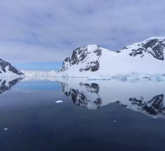 Prestine glass reflection on the waters of Antarctica