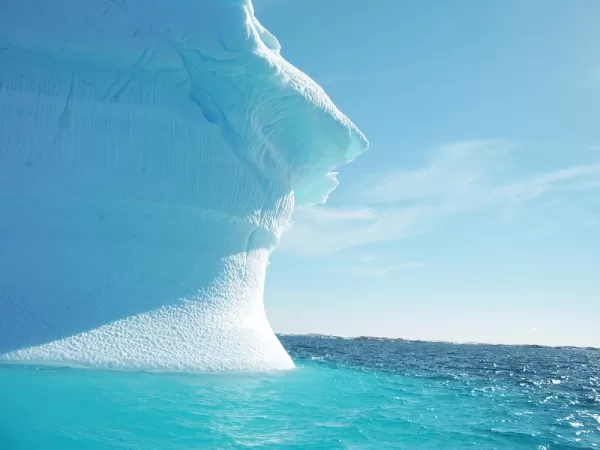 Cruising around a brilliant blue iceberg on an Antarctica adventure 