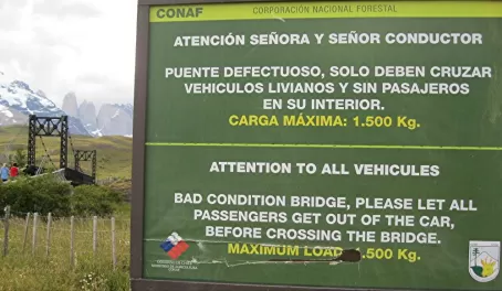 Bad Condition Bridge sign, Torres del Paine, Chile