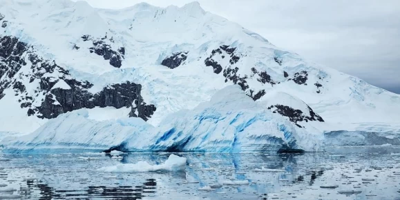 Shot of Paradise Bay, Antarctica, complete with many ice formations in the water.