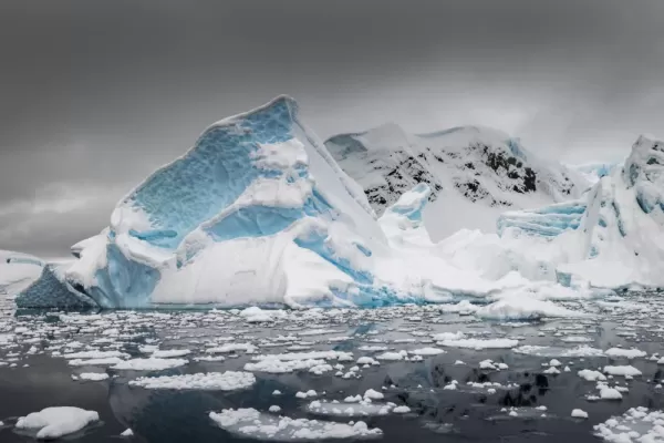 Iceberg covered in snow; Paradise Bay in Antarctica