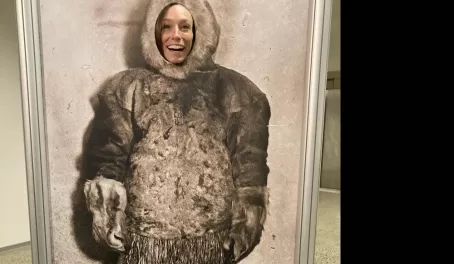 Taking a photo on a sami cut out display in a museum in Oslo, Norway.