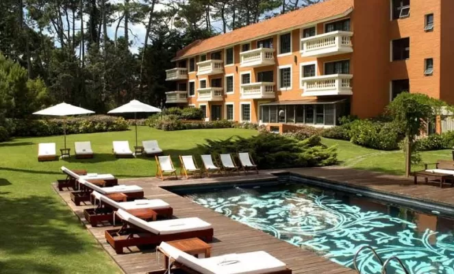 Relax by the pool during your stay at Barradas Parque Hotel