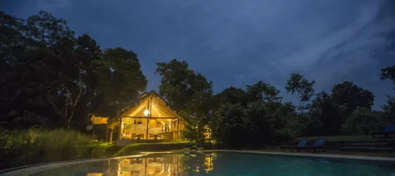 Restaurant and pool view at night