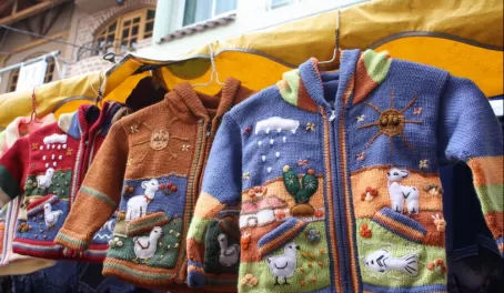 children's sweaters in the market at Octavalo