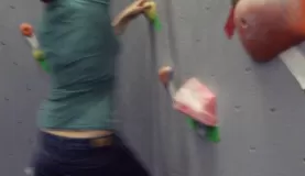 Ashley swings from one wall to the other