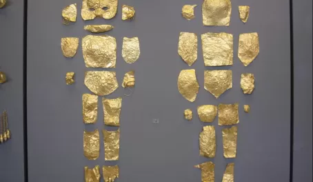 Gold burial covering for a child
