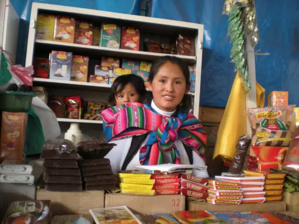 Local Beauty Selling Coffee & Chocolate at Cusco Market