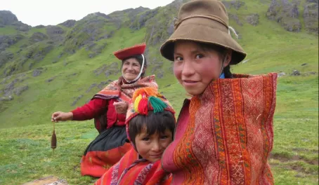 Spinning thread and smiles.  Peru.