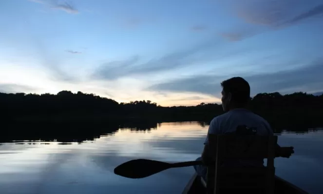 Soak in the Amazon from your night-time canoe explorations