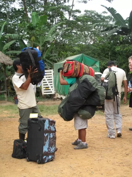 The super hero porters taking our bags to the river to head into Tambopata.