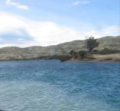 Confluence of milky glacial flow and fresh Serrano River water