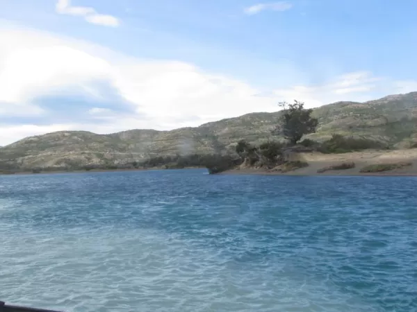 Confluence of milky glacial flow and fresh Serrano River water