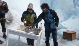 Pouring scotch on glacial ice at the top of the Perito Moreno glacier
