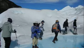 walking with crampons on glacier