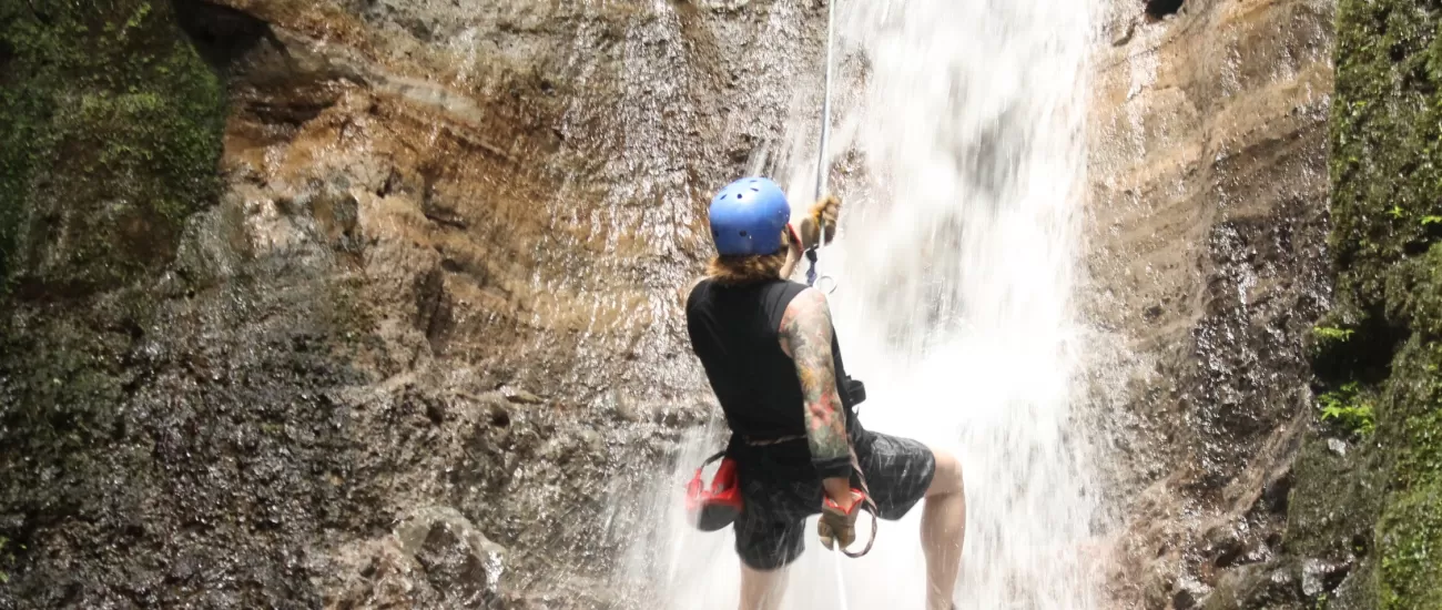 Rapelling waterfalls on the canyoning tour in Arenal