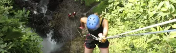 Rappelling waterfalls on a canyoning tour in Arenal