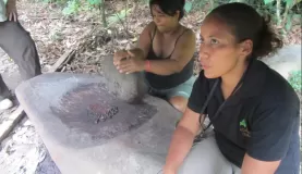 Our guide shows us traditional grinding techniques