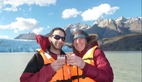 Enjoying pisco sours made with 10,000 year old glacial ice during our Grey Glacier boat tour