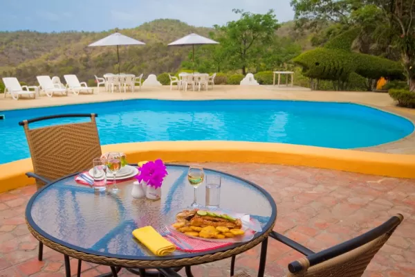 Enjoy the view while you have a snack by the pool at Mantaraya