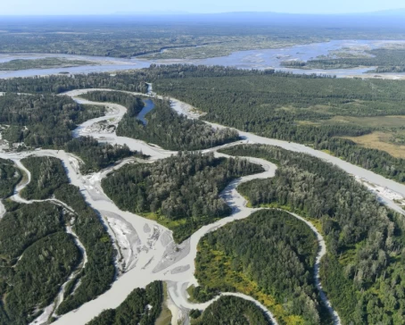 Glacial, braided type Talkeetna River displays “flour” colors and flows into mighty (somewhat clear) Susitna River