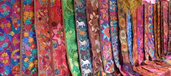Brightly colored weavings in the market