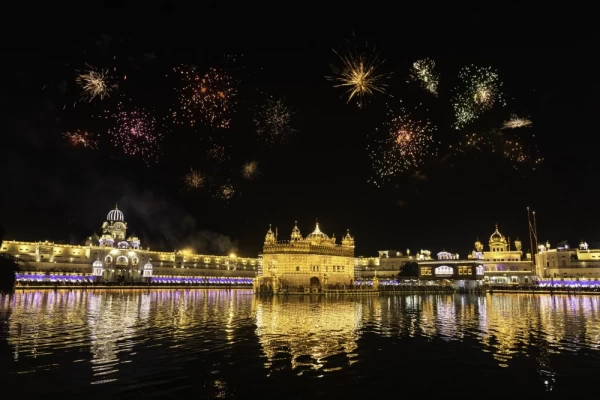 Golden Temple Amritsar lit by Diya and fire crackers Guru Purab festival and Diwali