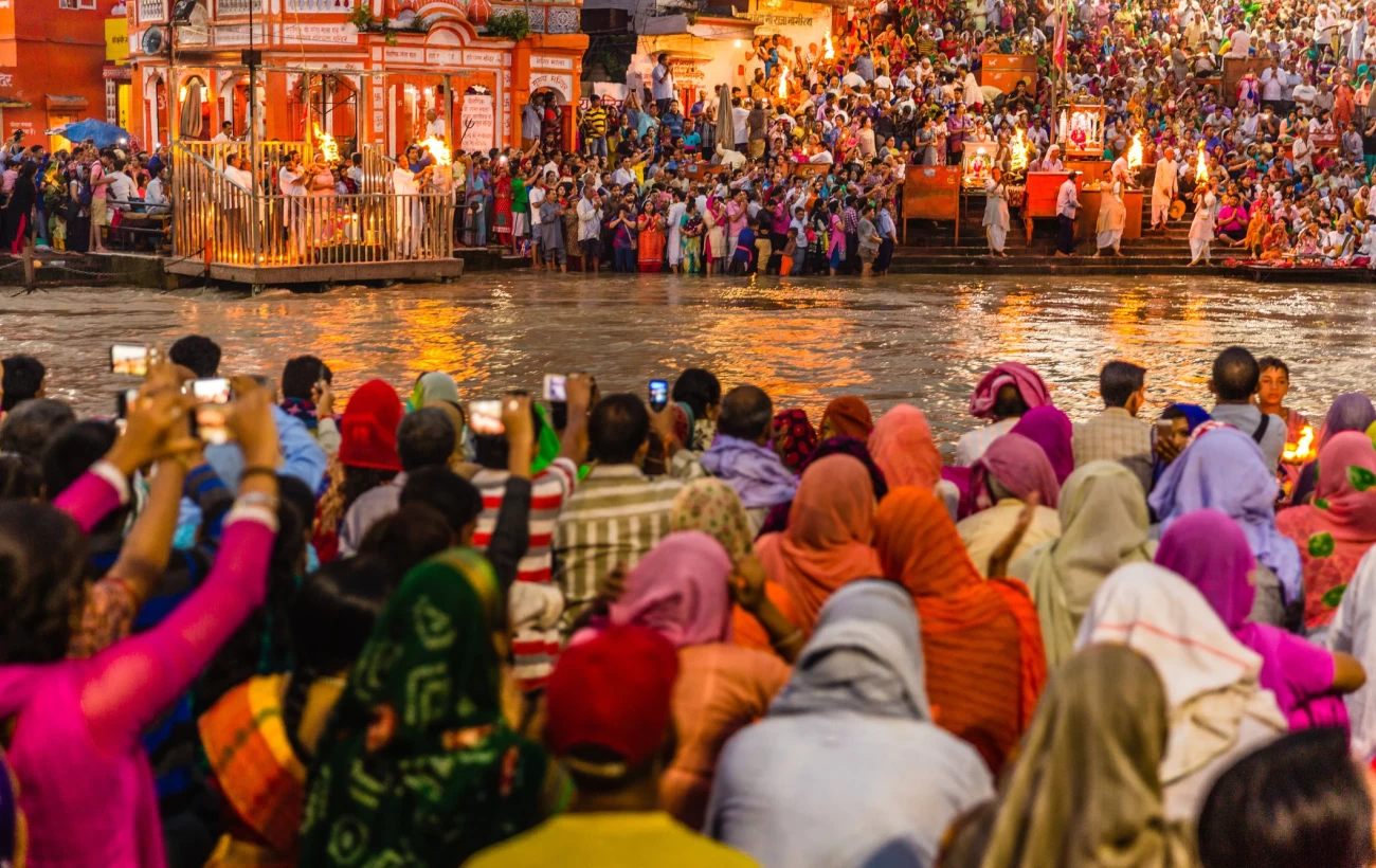 Hindu pilgrims gather in Haridwar for the evening Ganga Aarti to worship the Ganges.