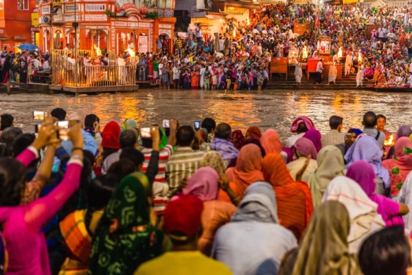 Hindu pilgrims gather in Haridwar for the evening Ganga Aarti to worship the Ganges.